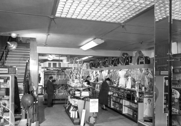 Customers in the Barnsley Co-op's sports department, South Yorkshire, 1957. Artist: Michael Walters