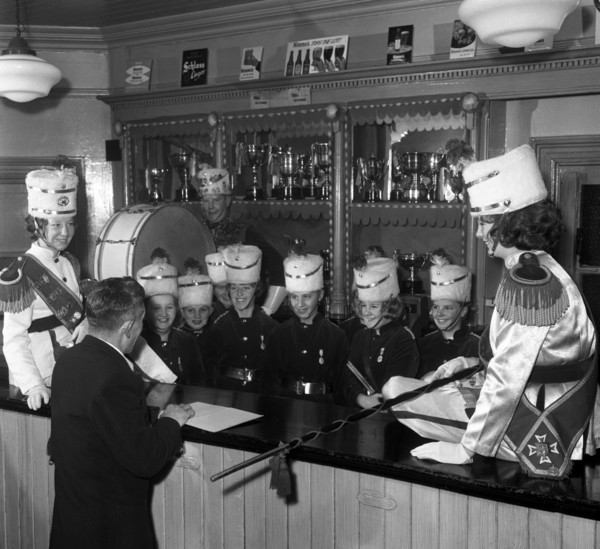 Informal shot of a female marching band, Horden, County Durham, 1963.  Artist: Michael Walters