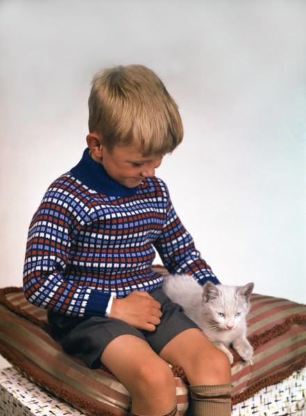 Child with a cat, 1963. Artist: Michael Walters