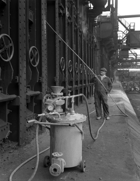 Spraying the ovens at Manvers coking works near Rotherham, South Yorkshire, 1963. Artist: Michael Walters