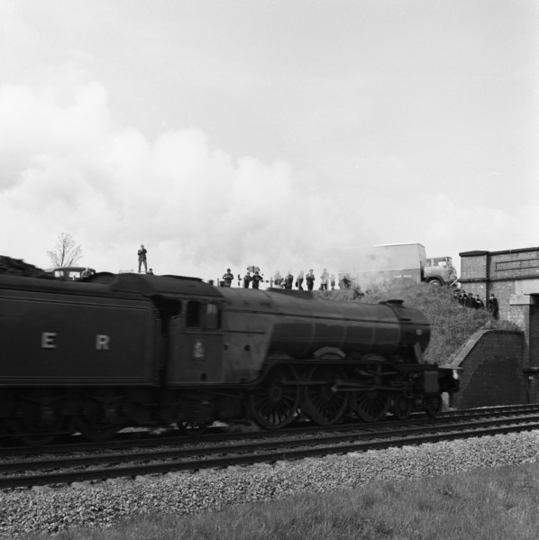The 'Flying Scotsman' passing under a bridge at speed, near Selby, North Yorkshire, 1968. Artist: Michael Walters