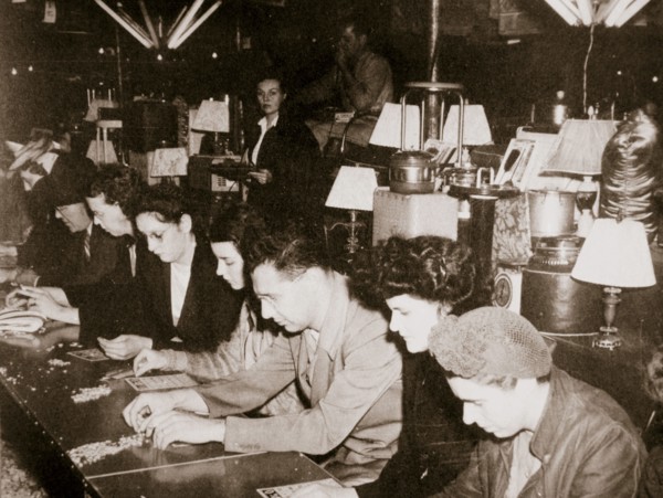 Automobile workers playing bingo at a carnival at Dearborn, Michigan, USA, c1938. Artist: Unknown