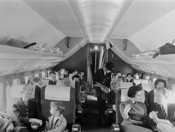 SAS stewardess serving on a flight, 1960. Artist: Torkel Lindeberg