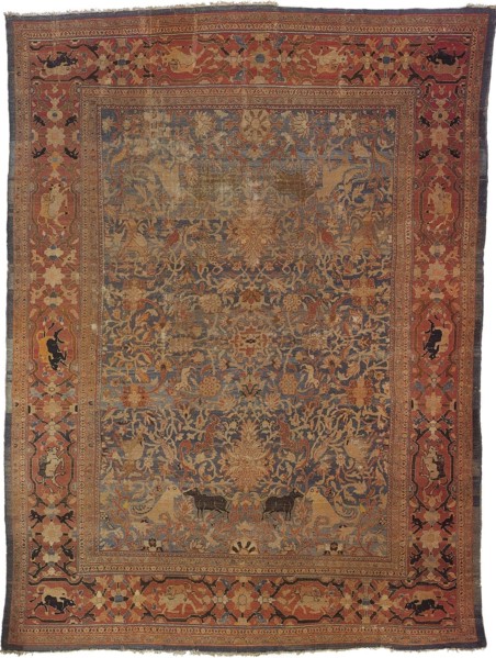 Amida carpet depicting the emblem of Emir: lion attacking bull.