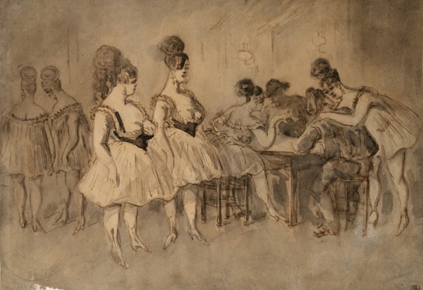 Men with scantily dressed women sitting at the table.