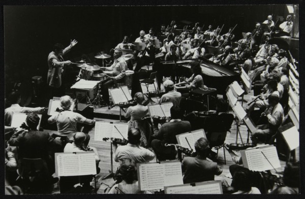 Buddy Rich and the Royal Philharmonic Orchestra in concert at the Royal Festival Hall, London, 1985. Artist: Denis Williams