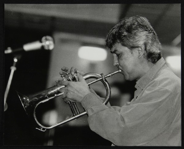 Dick Pearce playing the flugelhorn at The Fairway, Welwyn Garden City, Hertfordshire, 1999. Artist: Denis Williams