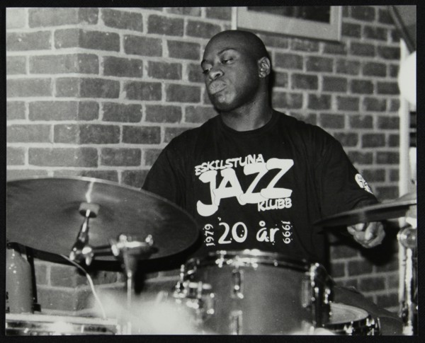 Winston Clifford on drums at The Fairway, Welwyn Garden City, Hertfordshire, 18 February 2001. Artist: Denis Williams