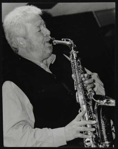 Geoff Simkins playing alto saxophone at The Fairway, Welwyn Garden City, Hertfordshire, 2002. Artist: Denis Williams