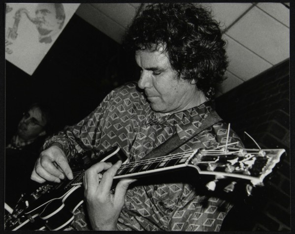 Guitarist John Etheridge playing at The Fairway, Welwyn Garden City, Hertfordshire, 9 November 2003. Artist: Denis Williams
