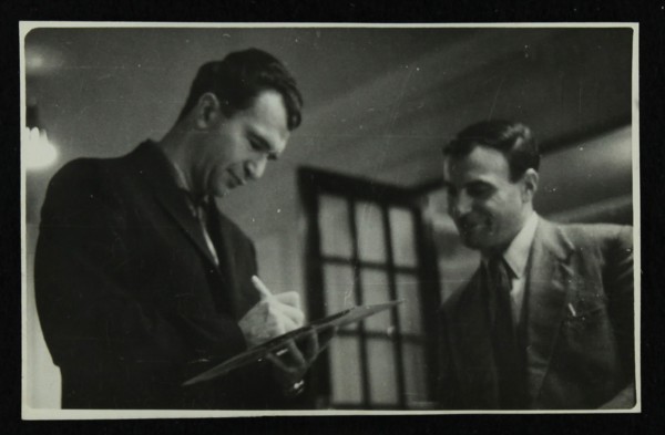Dave Brubeck signing an autograph, c1950s. Artist: Denis Williams