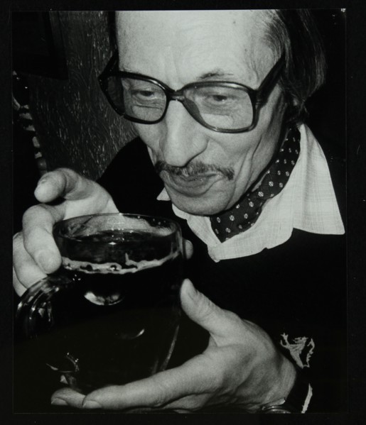 Tom Burnham with a pint at The Bell, Codicote, Hertfordshire, December 1986. Artist: Denis Williams