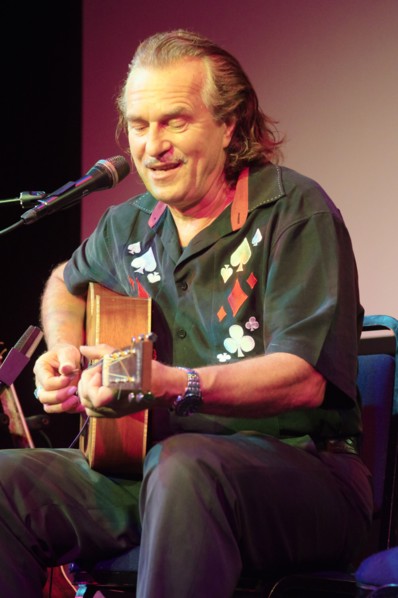 Hans Theessink, Hawth, Crawley, West Sussex, 2014.  Artist: Brian O'Connor.