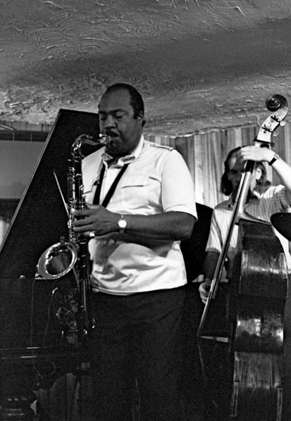 Nathan Davis and Peter Ind, Bass Clef, Hoxton Square, London, August 1987.   Artist: Brian O'Connor.