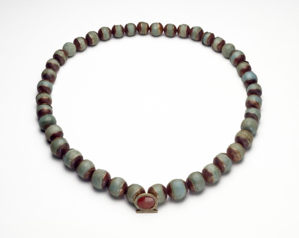 Faience cylinder and necklace, Middle Kingdom (c1975 BC-c1640 BC). Artist: Unknown.