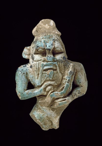 Faience amulet of Bes nursing a Horus, XXVth Dynasty (c770 BC-c715 BC). Artist: Unknown.