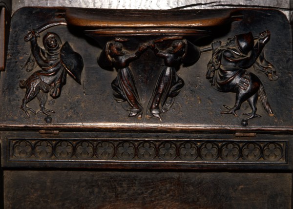Detail of the choir ashlar work of the Cathedral of Barcelona, made in oak wood, 'Reliefs of Mercy'.