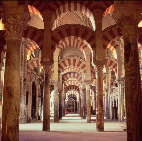 Interior view with columns of marble, jasper and granite in the Mosque of Cordoba.
