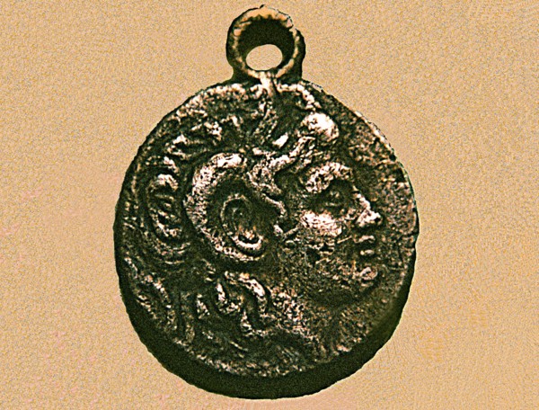 Silver coin with the head of Alexander the Great with the horns of the Egyptian god Amho, belongs?