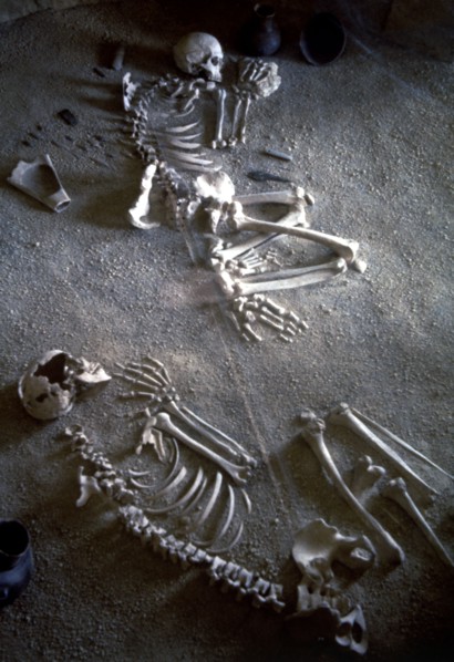 Collective burial, necropolis Ponte San Pietro (Lazio), detail of two adult skeletons of a man an?