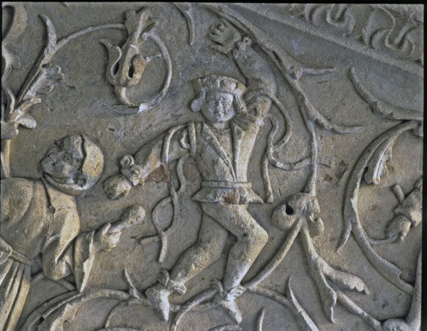 Stairway of the Senior Schools of the University of Salamanca. Detail of the relief of a dancer f?