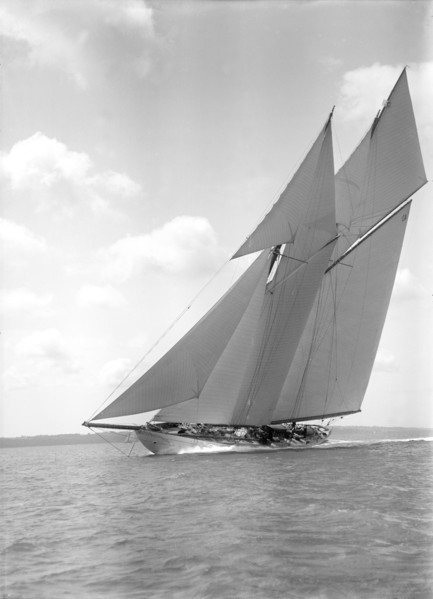 The 250 ton schooner 'Germania' sails close-hauled, 1911. Creator: Kirk & Sons of Cowes.