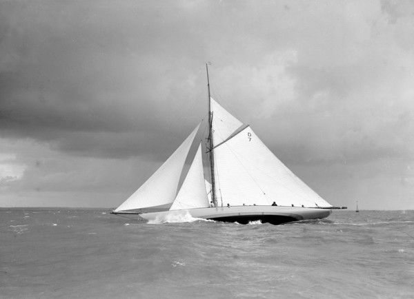 The 15 Metre class sailing yacht 'Istria' close-hauled and heeling in fresh breeze, 1912.  Creator: Kirk & Sons of Cowes.