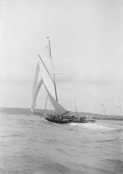 The gaff rigged cutter 'Bloodhound' sailing on a broad reach, August 1912. Creator: Kirk & Sons of Cowes.