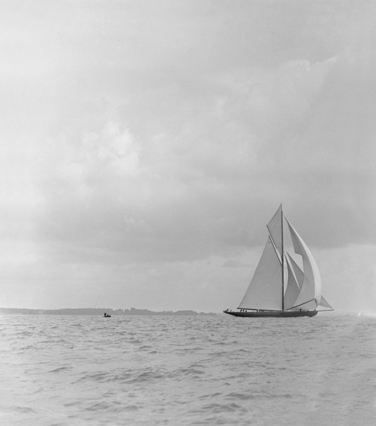 The racing cutter 'Terpisichore' running downwind, 1922. Creator: Kirk & Sons of Cowes.