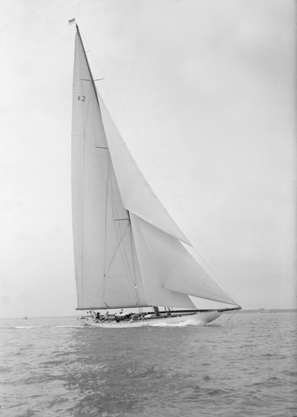 The 23-metre cutter 'Astra' sailing close-hauled, 1933. Creator: Kirk & Sons of Cowes.