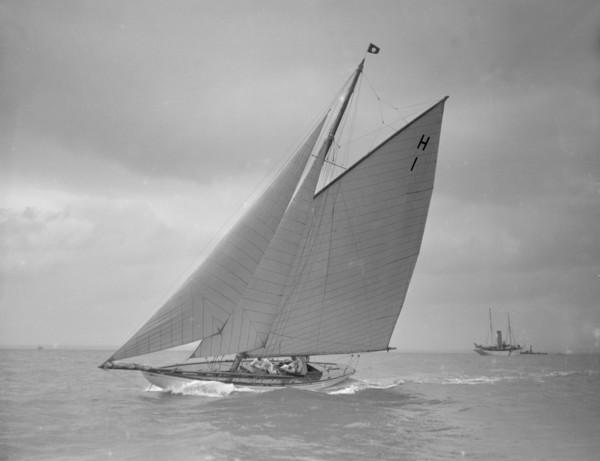 The 8 Metre class yacht 'Norman' (H1) sailing close-hauled, 1911. Creator: Kirk & Sons of Cowes.