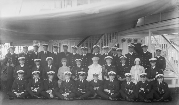 King George V, Queen Mary and crew on board 'HMY Victoria and Albert', 1927. Creator: Kirk & Sons of Cowes.