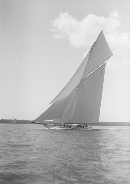 The 19-metre cutter 'Norada' sailing close-hauled, 1911. Creator: Kirk & Sons of Cowes.