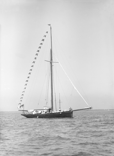 'Bloodhound' at anchor with flags, 1913. Creator: Kirk & Sons of Cowes.