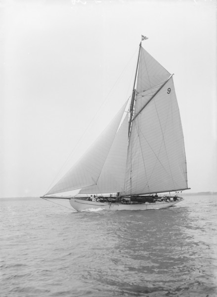 The cutter 'Westwind' sailing close-hauled, 1912. Creator: Kirk & Sons of Cowes.