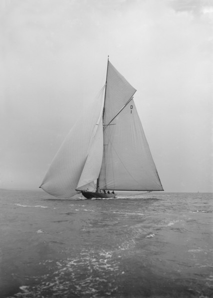 The majestic 15 Metre class 'Pamela' sailing with spinnaker, 1913. Creator: Kirk & Sons of Cowes.
