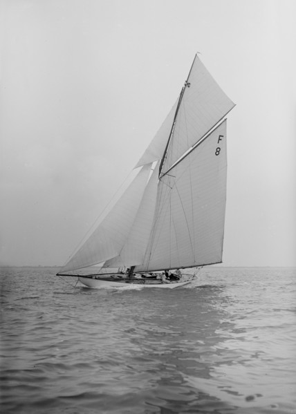 The International 10 Metre class 'Pampero' (F8) sailing close-hauled, 1913. Creator: Kirk & Sons of Cowes.