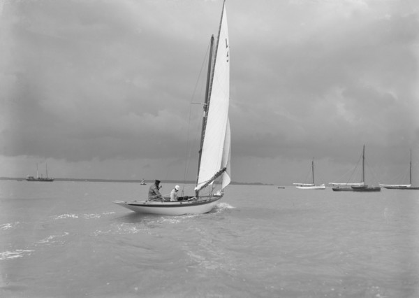 6 Metre Class 'Jonquil' (L5) with Captain R J Dixon at the helm. Creator: Kirk & Sons of Cowes.