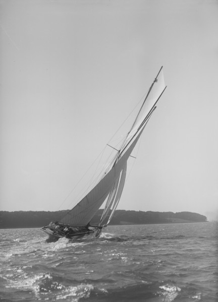 The 15 Metre cutter 'Ostara' sailing close-hauled, 1911. Creator: Kirk & Sons of Cowes.