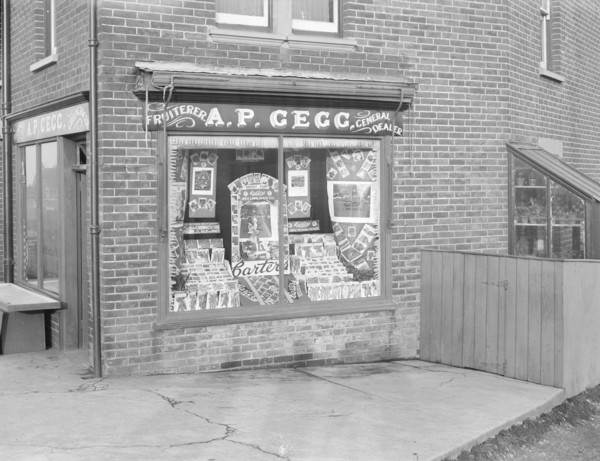Decorated shop window of AP Gegg, c1935. Creator: Kirk & Sons of Cowes.