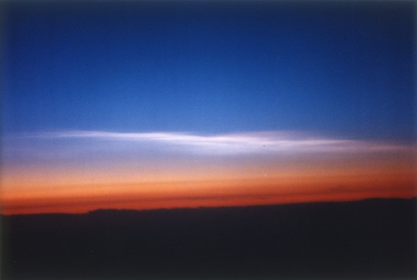 Clouds 39,000 feet north of Stavanger, Norway, seen from DC-8 plane. Creator: NASA.