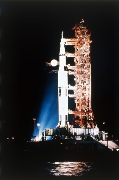 Apollo 9 Saturn V rocket with full moon, 1969.  Creator: NASA.