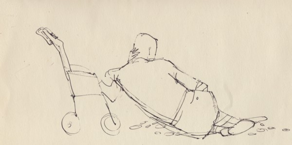 Man leaning against pushchair on the beach, c1950. Creator: Shirley Markham.