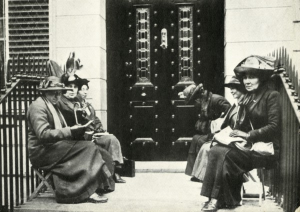 Suffragettes waiting on the doorstep of Sir Edward Carson's London home, 6 April 1914, (1947).