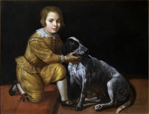 Portrait of a boy with a dog.