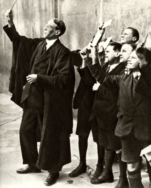 Schoolboys and teacher observing a solar eclipse, Britain