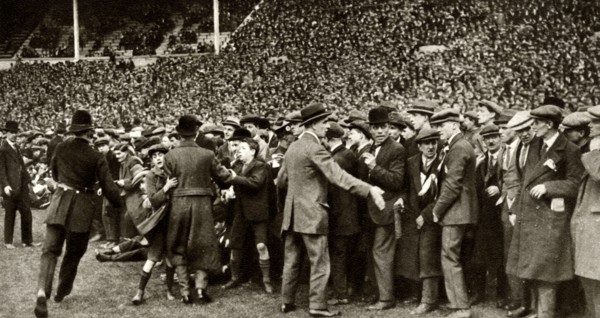 The first FA Cup Final is held at the new Wembley Stadium in London, 28 April 1923