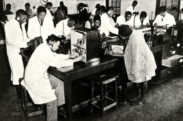 'Scenes in a Native College - Students in the physics laboratory', c1948