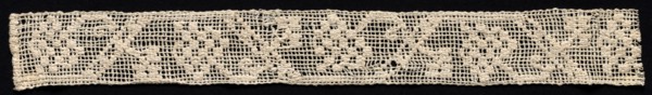 Fragment of a Band with Geometric Pattern and Floral Motif, 19th century. Creator: Unknown.