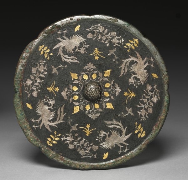 Mirror with Phoenixes, Birds, Butterflies, and Floral Sprays, 700s. Creator: Unknown.